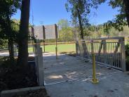 A new 15’ foot bridge connects football and baseball fields.