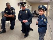 Deputy Chief and Officer Moore with young officer