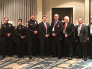 Chief Gary Yandura (third from right) receives the Outstanding Chief of the Year Award from GACP.