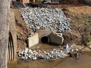 Donaldson Dr storm sewer repair-headwall and riprap installation