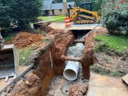 New PVC storms sewer pipe placement under utilities