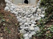New Headwall with energy dissipation and outfall riprap