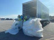 Volunteers break up more than 300 pounds of Styrofoam