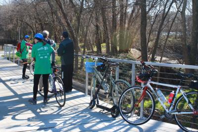 Cyclist and pedestrians at the grand opening of the Peachtree Creek Greenway. 
