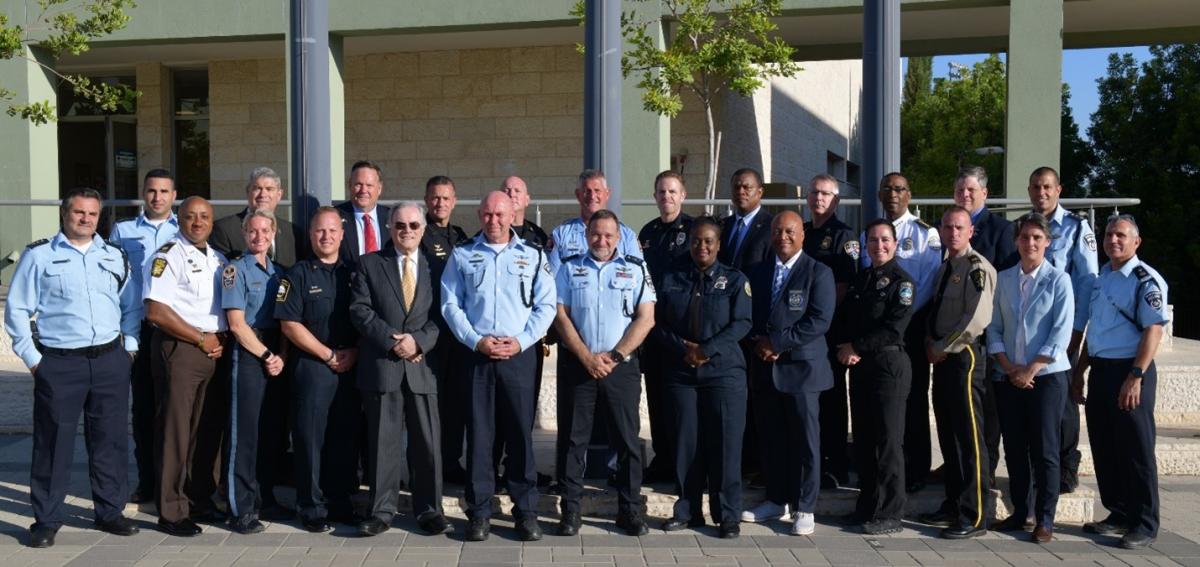 Deputy Chief Gurley (front row, fourth from left) joined 15 other high ranking law enforcement officers for training.
